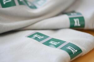 Casual Gray Sweatshirts available with specific Size Labels printed on them photo