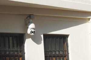 Security Camera Successfully Mounted on the Wall for Optimal Surveillance Purpose and Use photo