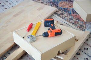 Essential Tools Required for DIY Furniture Assembly on a Beautiful and Stylish Rug Surface photo