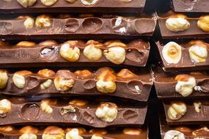 Delicious Chocolate Bars that are filled with Hazelnuts and a rich Caramel Filling photo