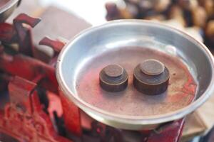 A beautiful and functional Vintage Weighing Scale that comes complete with its weights photo