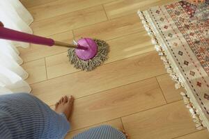 Achieve Efficient Floor Cleaning with a Mop on Your Wooden Surface for Optimal Results photo