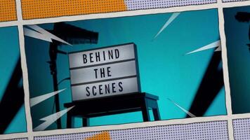Behind the scene light box in front of vdo camera frame. Black text on white lightbox of word Behind the scenes. Prop for filmmaker movie or film studio. Footage for B roll film production making of. video