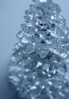 Patterned Clear Crystal With Soft Blue Backlight Closeup View Vertical Stock Photo