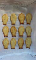 Freshly Baked Salt Fish Crackers In Lines Inside Bread Basket Vertical Stock Photo