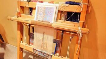 materials and equipment used in the making of the Turkish carpet in Turkey photo