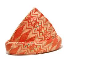 Tanjak is also known as traditional men's headgear in Palembang, South Sumatra. Tanjak is made from woven cloth with a Palembang songket pattern photo