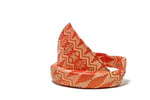 Tanjak is also known as traditional men's headgear in Palembang, South Sumatra. Tanjak is made from woven cloth with a Palembang songket pattern photo