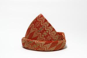 Tanjak is also known as traditional men's headgear in Palembang, South Sumatra. Tanjak is made from woven cloth with a Palembang songket pattern photo