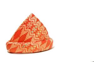 Tanjak is also known as traditional men's headgear in Palembang, South Sumatra. Tanjak is made from woven cloth with a Palembang songket pattern photo