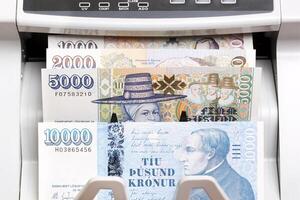 Icelandic money in a counting machine photo