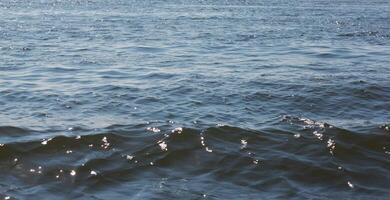Horizontal background of water waves from the river Nile in Egypt. photo