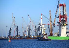 Variety of cranes at the port of Rostock photo