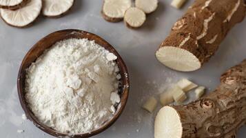 Cassava root flour gluten free on wooden bowl for healthy bread photo