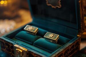 Close up view of exquisite Art Deco cufflinks displayed in an elegant velvet box. photo
