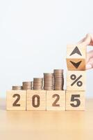 2024 to 2025 New year with percentage change to UP and Down arrow with coin stack. Interest rate, GDP, stocks market, financial, deflation and Inflation, mortgage, debt, Loan and Economic Recession photo