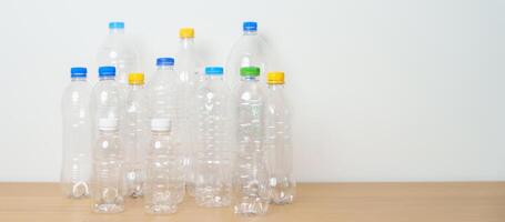 Plastic bottle on table at home or office. Recycle garbage Sorting. Plastic Free, Ecology, Environmental, pollution, Dispose recycling, waste management and trash Separation concept photo