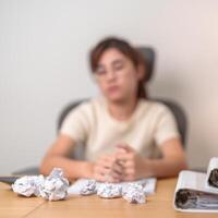 stressed Asian Woman with mistake paper, Tired female businesswoman working overload at office, Exhausted casual woman with documents folder stack at late night in home. Failure, Problem and business photo
