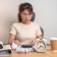 stressed Woman with mistake paper and clock, Tired female businesswoman working overload at office, Exhausted woman with document folder stack at late night in home. Failure, Problem and business photo