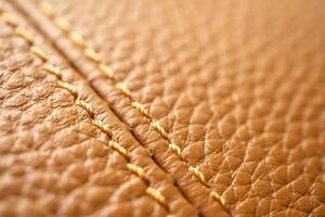 luxury brown leather bag texture background with stitching photo