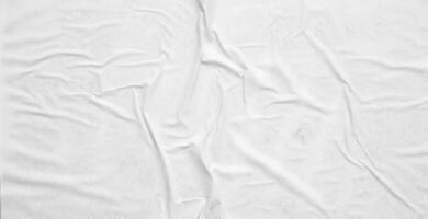 white crumpled and creased paper poster texture background photo