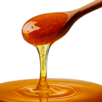 a wooden spoon is being poured into a drop of liquid png