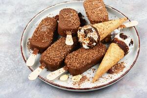 Assorted ice creams on stick. photo