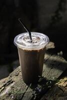 Iced cocoa smoothie in a plastic cup photo