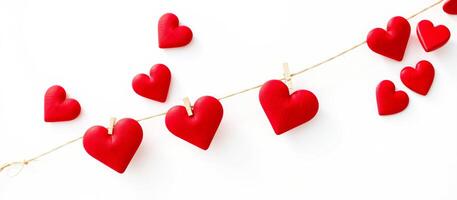 Red Heart Decorations Hanging On String photo