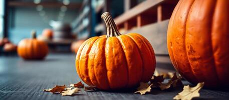Pumpkin on a wooden table with leaves photo