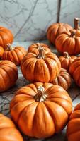 Close Up of Pumpkins on a Marble Surface photo