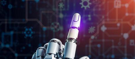 Robotic finger pointing on a circuit board photo
