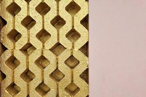 Gold and Pink Paint on Concrete Wall Texture Background. photo