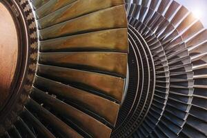 Turbine Blades, High Precision Engineering. Large Fan Stack Layer Metal Part Rotor In Jet Engine Or Steam Power Plant. photo