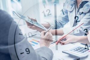 Business times, Business people teamwork working challenge with time clock speed with performance against working hours concept photo