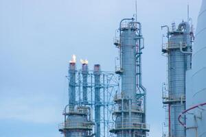Methane Gas Fire High Flare Stack Flaring Tower Platform in Refinery Petroleum Plant or Flame Burn On Offshore Oil Extraction Process. photo
