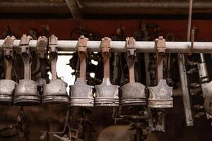 Old used rusty dirty motor part, Engine piston for second hand replace spare parts. photo