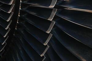 Turbine Blades, High Precision Engineering. Large Fan Stack Layer Metal Part Rotor In Jet Engine Or Steam Power Plant. photo