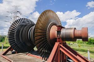 Turbine Blades, High Precision Engineering. Large Fan Stack Layer Metal Part Rotor In Jet Engine Or Steam Power Plant. photo