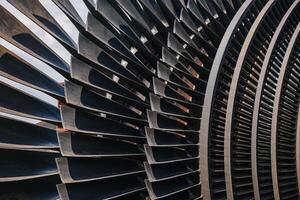 Turbine Blades, High Precision Engineering. Large Fan Stack Layer Metal Part Rotor In Jet Engine Or Steam Power Plant. photo