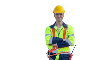 Young Caucasian smart engineer worker male standing confident arm crossed looking camera smiling dressing safety reflection suit isolated on white background. photo