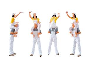 Miniature figurine of two painters isolated on white background with clipping path photo