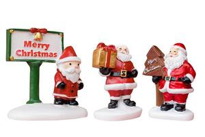Miniature Santa Claus figurine isolated on a white background with a clipping path photo