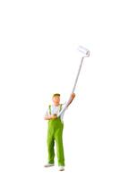 A miniature figurine of a painter holding a long-handled roller brush, isolated on white background with clipping path photo