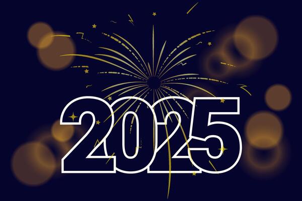 Fireworks and bokeh 2025. Year 2025 numbers on dark background.