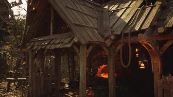 A rustic blacksmith workshop with warm light during golden hour video