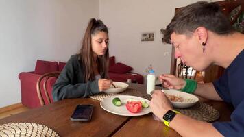 A Couple Who Are Joyfully Enjoying a Delicious Breakfast Together in a Cozy and Inviting Setting video