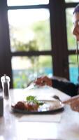 A Woman Delighting in a Meal Within a Comfortably Cozy and Inviting Setting and Atmosphere video