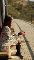 A contemplative woman is amidst a serene nature setting that exudes tranquility video