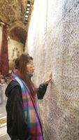 Engaging in the fascinating exploration of ancient artifacts within a museum setting video